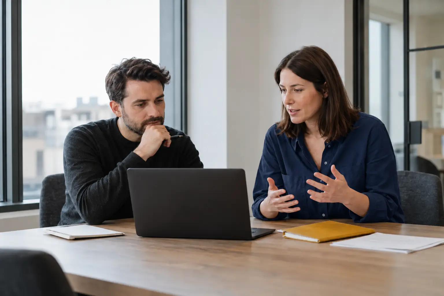 Two affiliate partnership professionals discussing a retailer connection